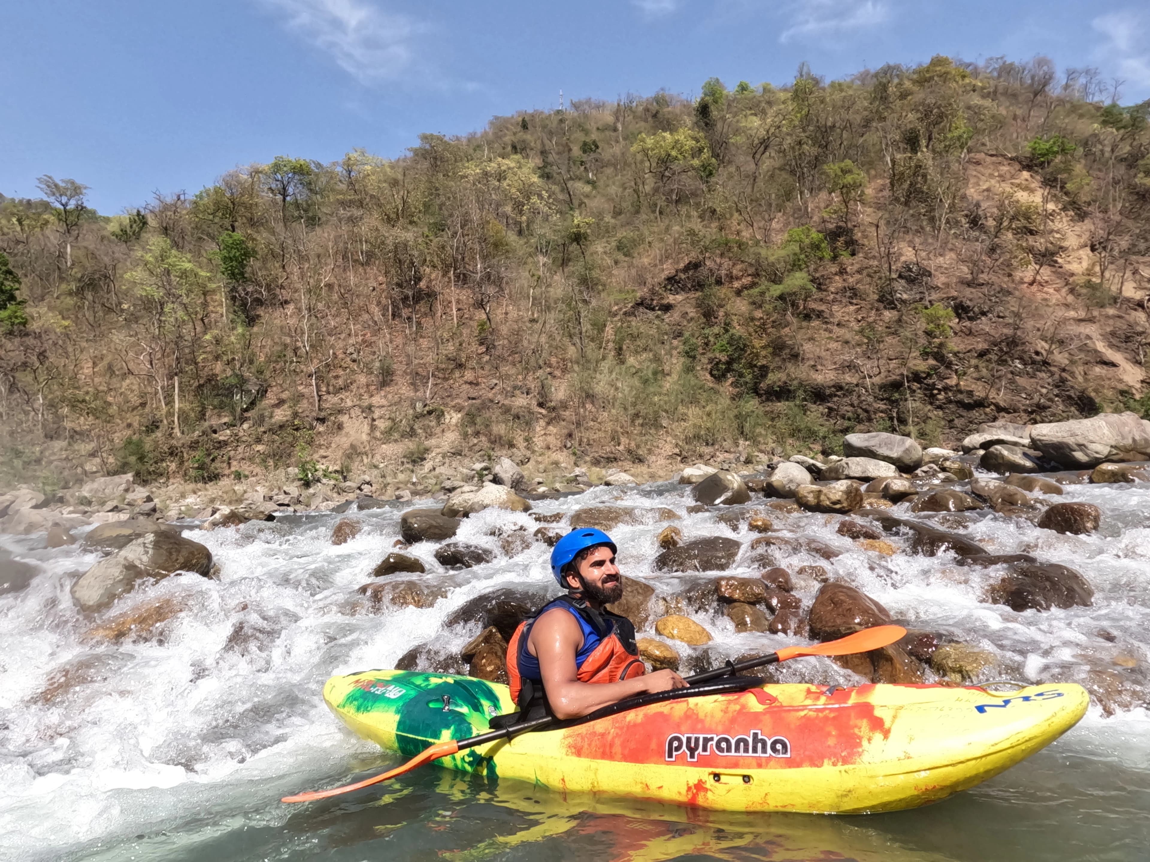 Kayak students with their instructor on the Ganga